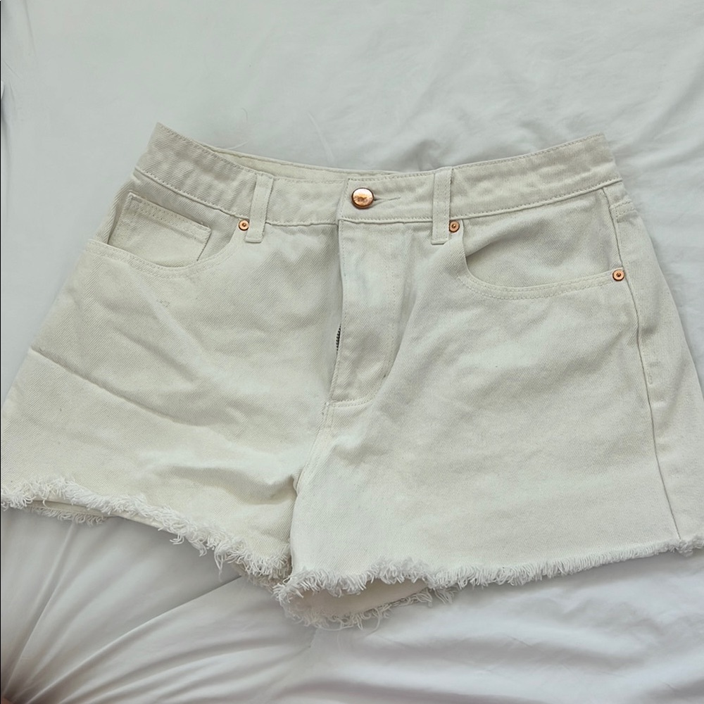 JustFab Cream Jean Shorts with Distressed Hem